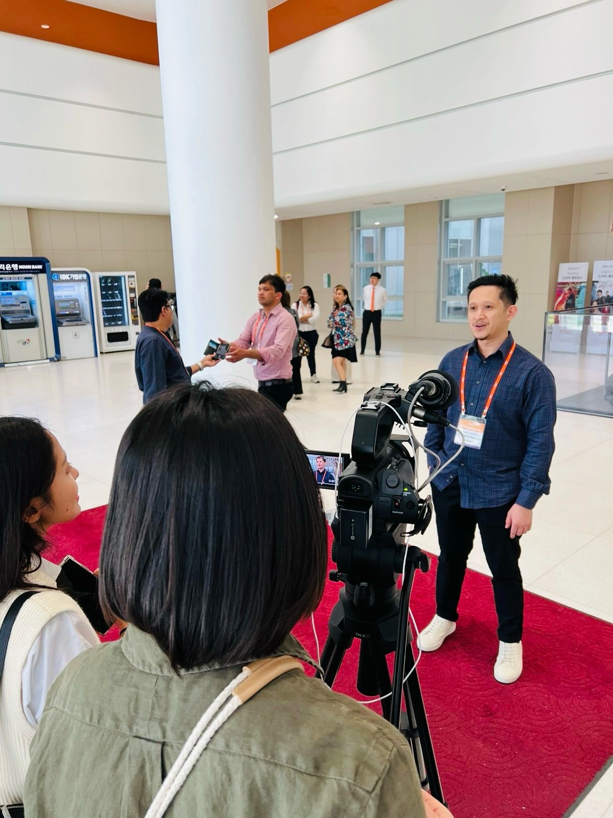 Dr. Villanueva of Affinity Dental Clinics being interviewed during the Osstem World Meeting 2024 in Seoul, South Korea
