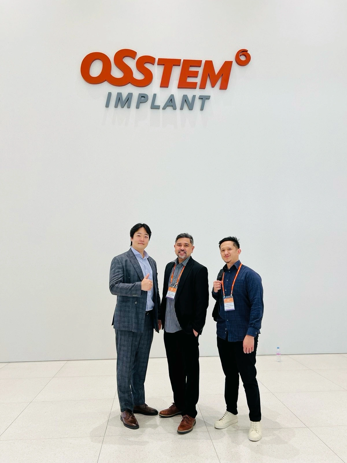 Affinity Dental implant surgeons Dr. Regala and Dr. Villanueva with Osstem Philippines President Terry Lee at the Osstem World Meeting 2024 in Seoul, South Korea