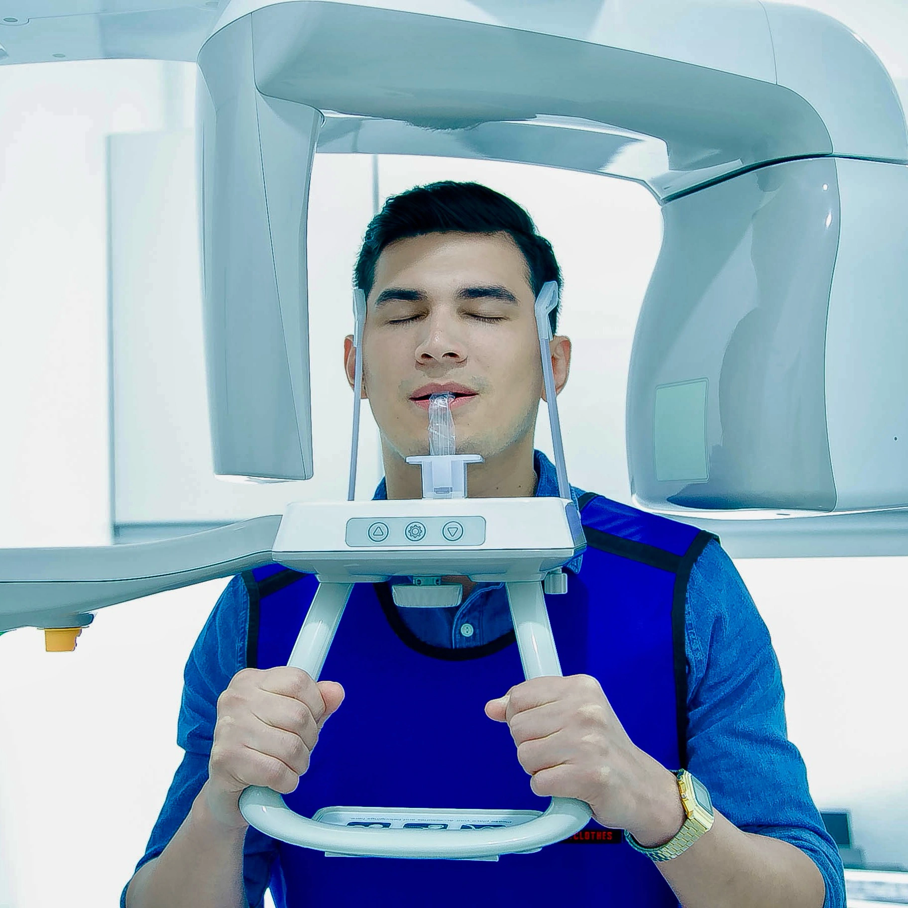 Male patient undergoing a digital panoramic dental X-ray at Affinity Dental Clinics Makati.