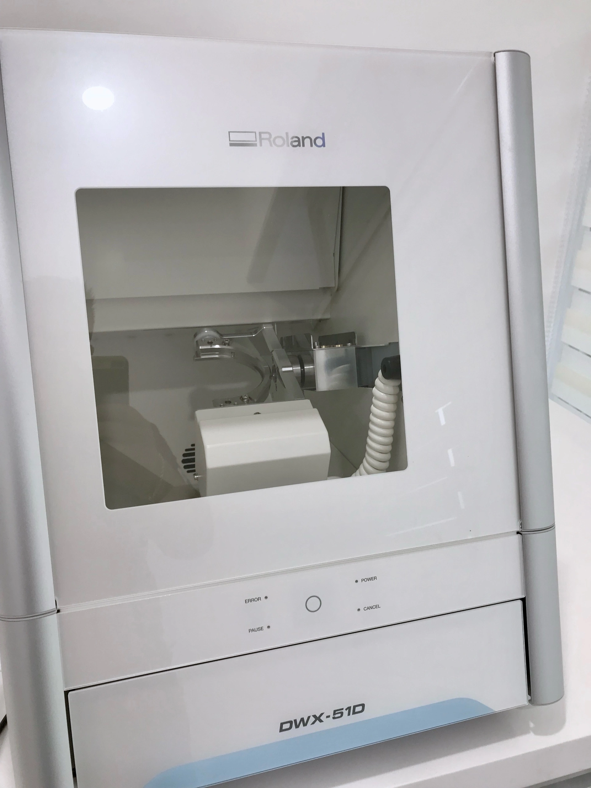 Roland DWX-51D milling machine in the in-house digital dental laboratory of Affinity Dental Clinics Makati used for precision zirconia crowns and bridges