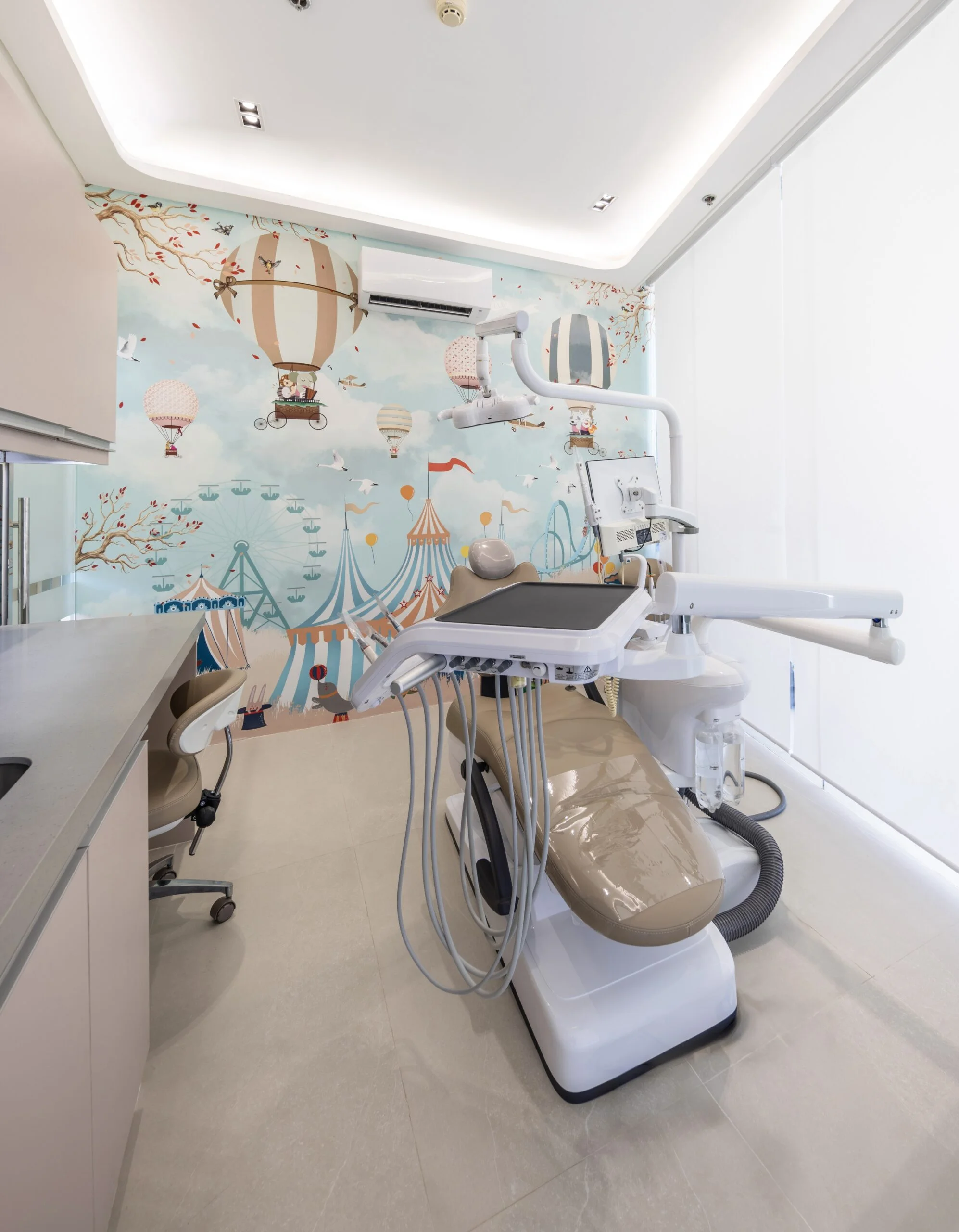 Kid-friendly dental room with colorful wall art and child-sized dental equipment at Affinity Dental Clinics Alabang