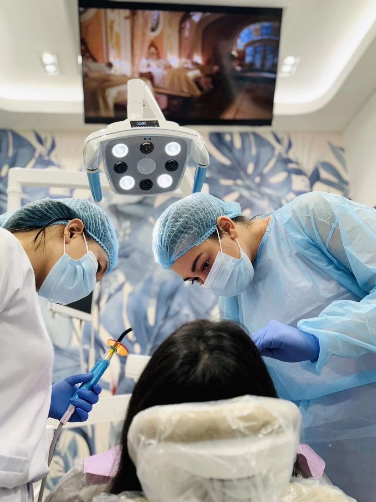 Dentists performing a procedure on a patient at Affinity Dental Clinics BGC Stopover