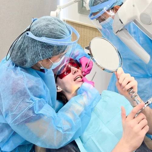 Patient undergoing professional teeth whitening procedure at Affinity Dental Clinics BGC Stopover with dentist supervision