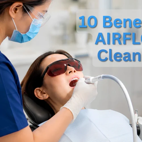 Dentist performing professional AirFlow teeth cleaning in a modern dental clinic using advanced AirFlow technology for gentle plaque and stain removal.